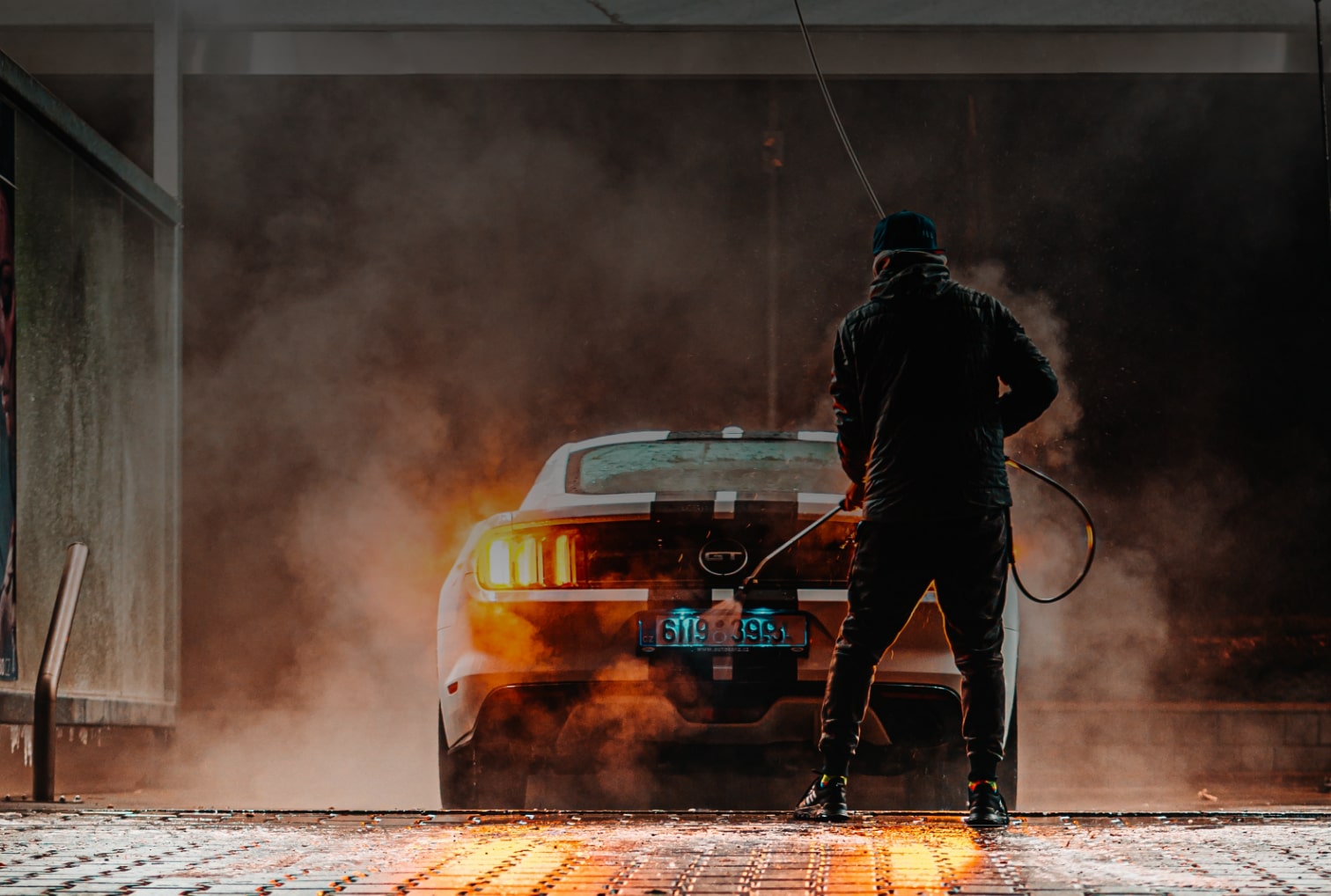 Professional washing a car